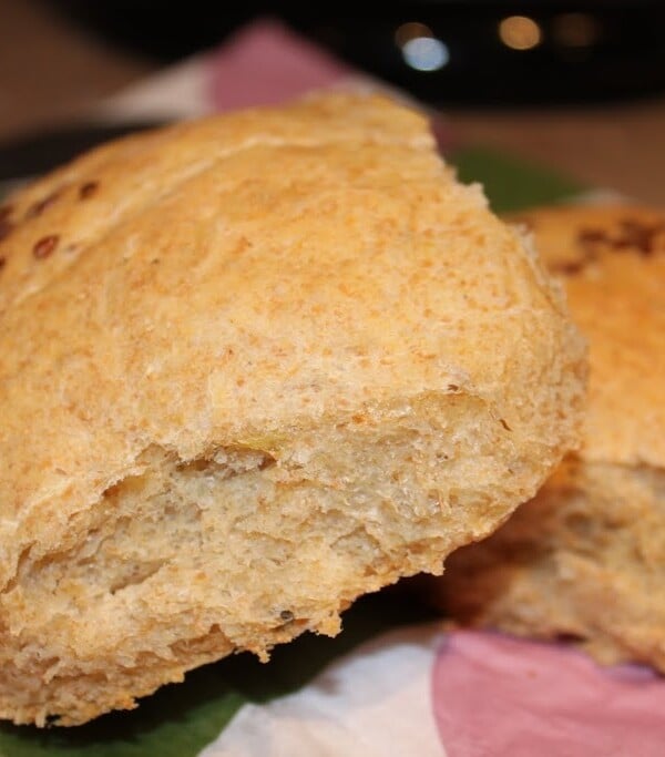 Two lentil curry buns on a work surface