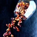 Berry Granola spilling out of a tumbler