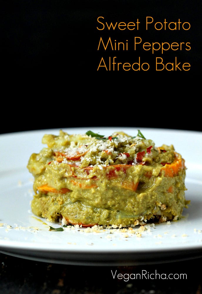 side view if vegan alfredo bake with spinach cashew cheese sauce, sweet potatoes and yams