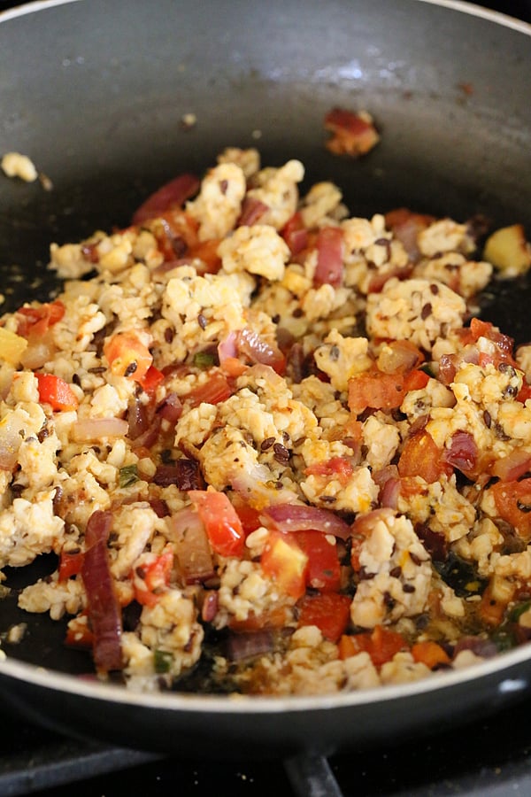 tempeh scramble vegan tempeh scramble sauteeing in a pan with veggies