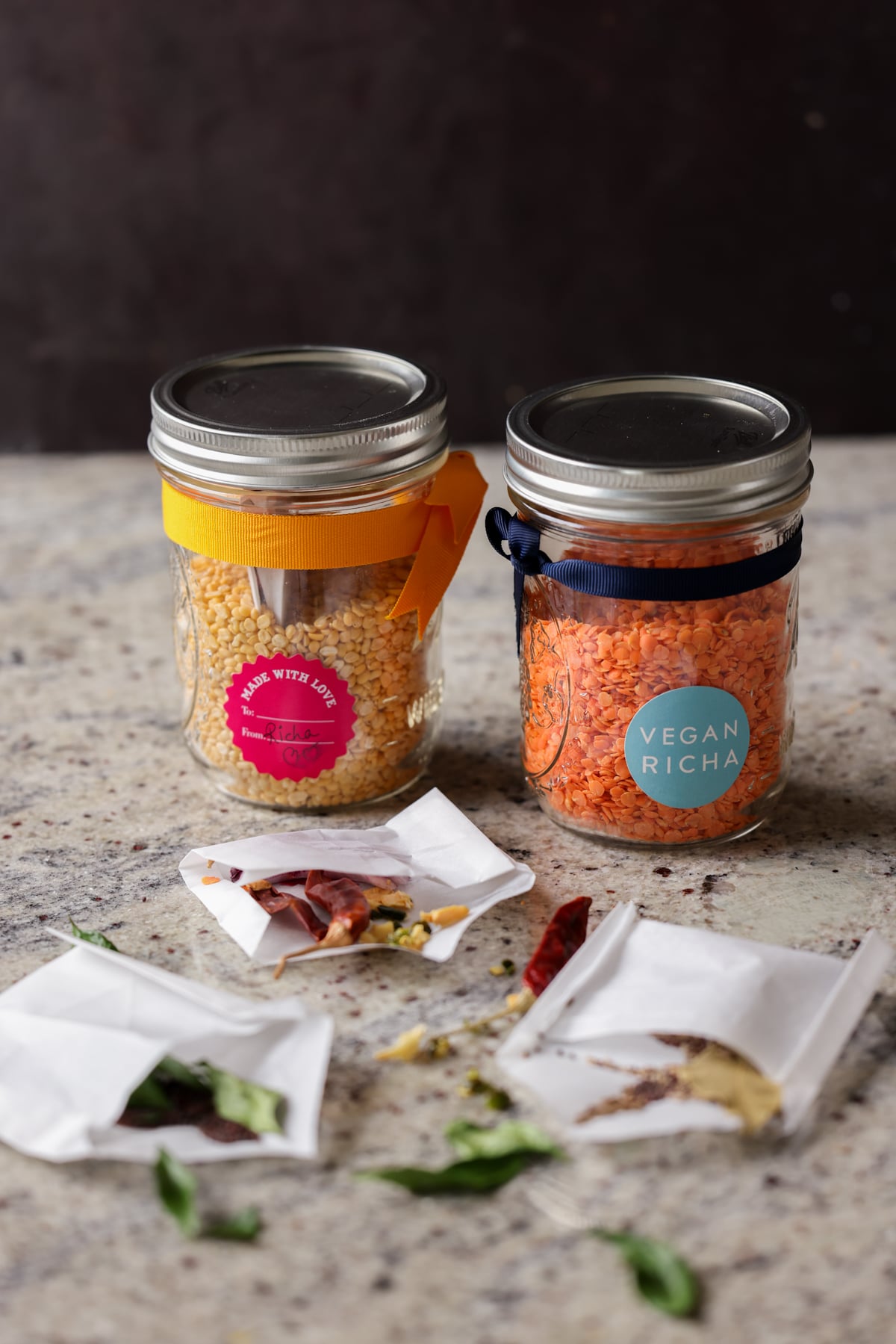 open jars of lentil soup mix with open spice pouches