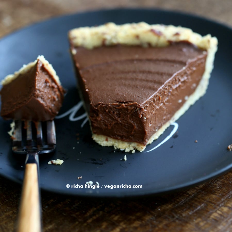 vegan pumpkin pie a slice of Vegan Chocolate Pumpkin Pie with one forkful missing