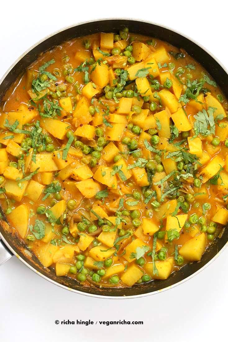 Vegan Bombay Potatoes and Peas | https://veganricha.com Easy Indian Spiced Potato and Pea curry. #vegan #glutenfree #soyfree #Indian