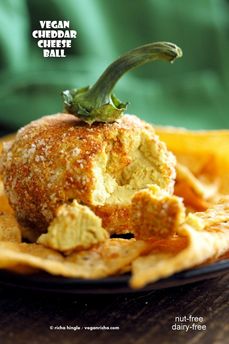Vegan Cheese Ball. Nut-free Cheddar Cheese ball for Halloween. Shape like pumpkin or make a Jack o lantern. | VeganRicha.com #Vegan #Cheese #Recipe #dairyfree #soyfree