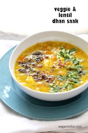 Lentil Veggie Dhansak. Dal and vegetables cooked with spices. Parsi dhansak Recipe. Serve over rice or flatbread or garlic bread. Vegan Gluten-free Indian Recipe | VeganRicha.com