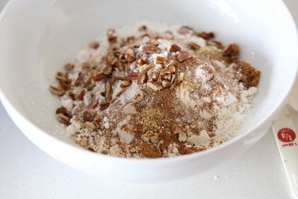 Vegan Pumpkin Coffee Cake with Pecan Crumb. Easy 1 Bowl Pumpkin Cake, topped with Chai Spice Pecan Streusel. Just 15 mins prep. Soft, Spiced, Delicious. Vegan Soy-free Recipe. | VeganRicha.com
