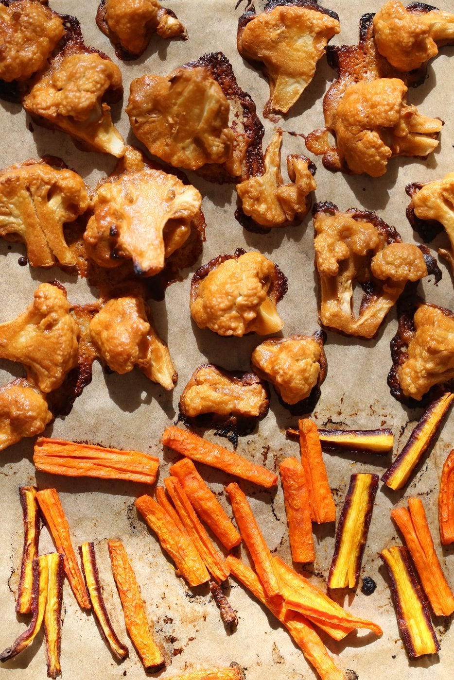 Peanut Butter Cauliflower Bowl with Roasted Carrots. Cauliflower tossed in peanut butter sauce and roasted, carrots tossed in hot sauce and roasted. Vegan Recipe, Gluten-free Recipe. | VeganRicha.com