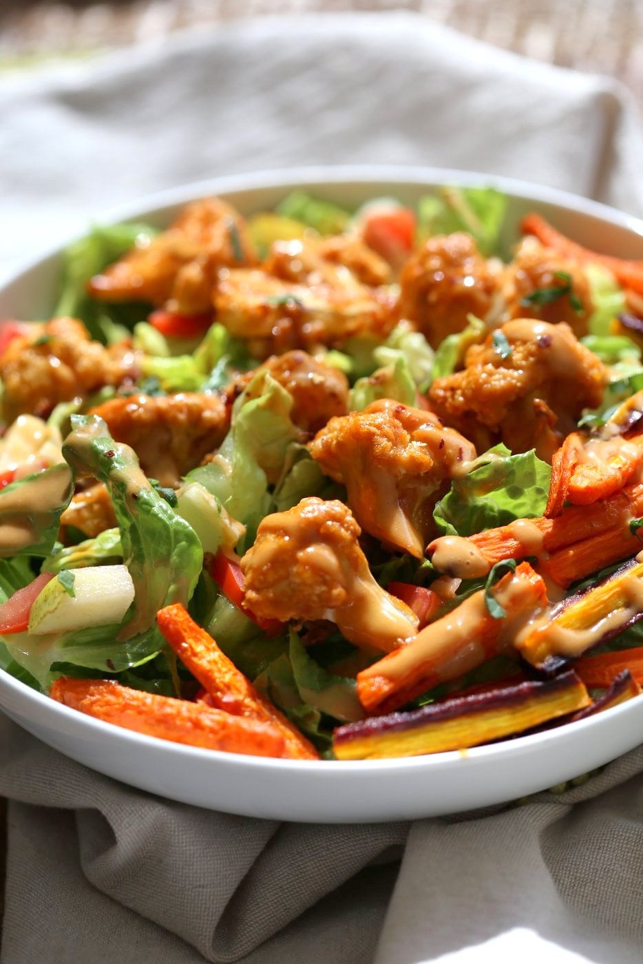 Peanut Butter Cauliflower Bowl with Roasted Carrots. Cauliflower tossed in peanut butter sauce and roasted, carrots tossed in hot sauce and roasted. Vegan Recipe, Gluten-free Recipe. | VeganRicha.com