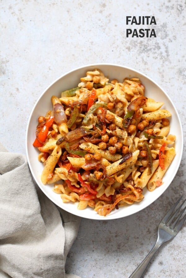 Vegan Fajita Pasta with Chickpeas and veggies. Easy Weeknight pasta with Taco seasoned veggies and beans mixed with creamy pasta. Vegan Soyfree Recipe. Can be gluten-free.ย #vegan #veganricha