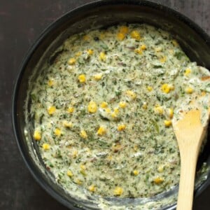 Vegan Spinach Dip Breadsticks. Creamy Corn and Spinach dip spread over pizza crust or puff pastry, bake, slice and serve. Easy Vegan Recipe. Can be gluten-free if served as a dip #vegan #veganricha #recipe #spinachdip | VeganRicha.com