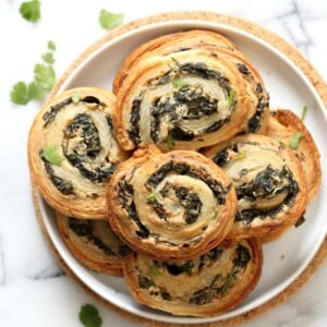 Vegan Spinach Pinwheels. Creamy cheesy Spinach dip spread on puff pastry, rolled, sliced and baked to make a great Snack. #Vegan #Soyfree #Recipe #veganricha | VeganRicha.com