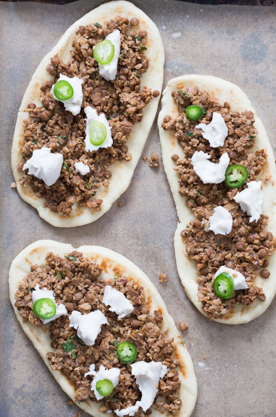 Vegan Keema Naan with Keema Lentils, onion, carrots and walnuts. These lentils with the herbs and spices make a vegan version of keema. Serve over Naan bread or Pizza or fill tacos or wraps. #Vegan #Recipe #veganricha, Can be gluten-free and soy free. | VeganRicha,com
