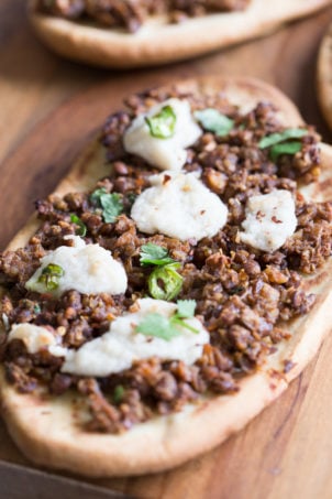 Vegan Keema Naan with Keema Lentils, onion, carrots and walnuts. These lentils with the herbs and spices make a vegan version of keema. Serve over Naan bread or Pizza or fill tacos or wraps. #Vegan #Recipe #veganricha, Can be gluten-free and soy free.ย | VeganRicha,com