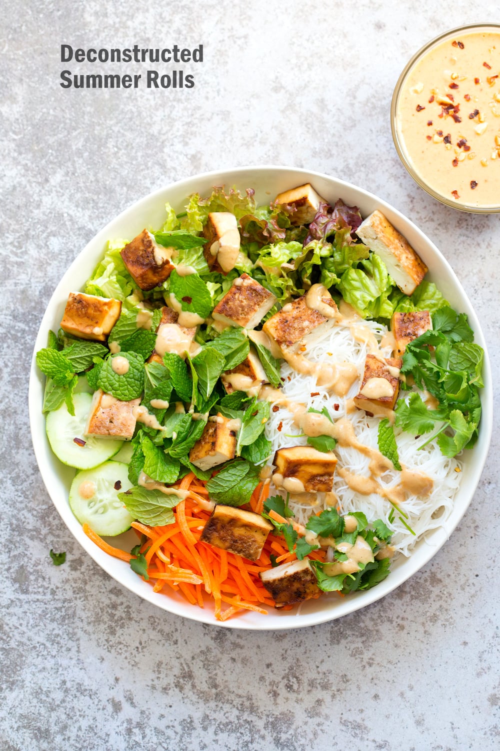 Crunchy Veggie Vegan Summer Rolls Deconstructed into a Bowl. Served with Peanut Butter Dipping Sauce. Fresh Spring Rolls/ Rice paper rolls in a bowl. Make a bowl, wrap or fill up rice paper wrappers. #Vegan #Glutenfree #oilfree #refinedsugarfree #Recipe #veganricha Use Sunbutter to make #nutfree | VeganRicha.com 