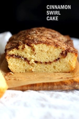 This Vegan Cinnamon Swirl Cake is super Easy and Quick. A simple yellow cake, swirled with cinnamon sugar makes for a delightful treat. Add some nuts into the swirl for variation #Vegan #Nutfree #Soyfree #Dessert #Recipeย #veganricha | VeganRicha.com