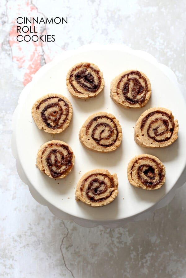 Vegan Cinnamon Roll Cookies. Soft shortbread like cookie dough dusted with cinnamon sugar, rolled, sliced and baked for cinnamon roll bites. #Vegan #Soyfree #VeganRicha #Recipe.ย