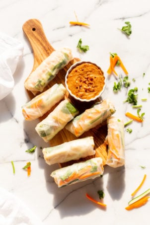 Easy Vegan Fresh Spring Rolls with Peanut Sauce. Rice paper Fresh Rolls with Marinated Tofu and Quick Peanut Dipping Sauce. #Vegan #VeganRicha #VeganSpringrolls #VeganSummerrolls Glutenfree #Recipe Can be Nutfree with Sunbutter or Sweet Chili sauce.ย