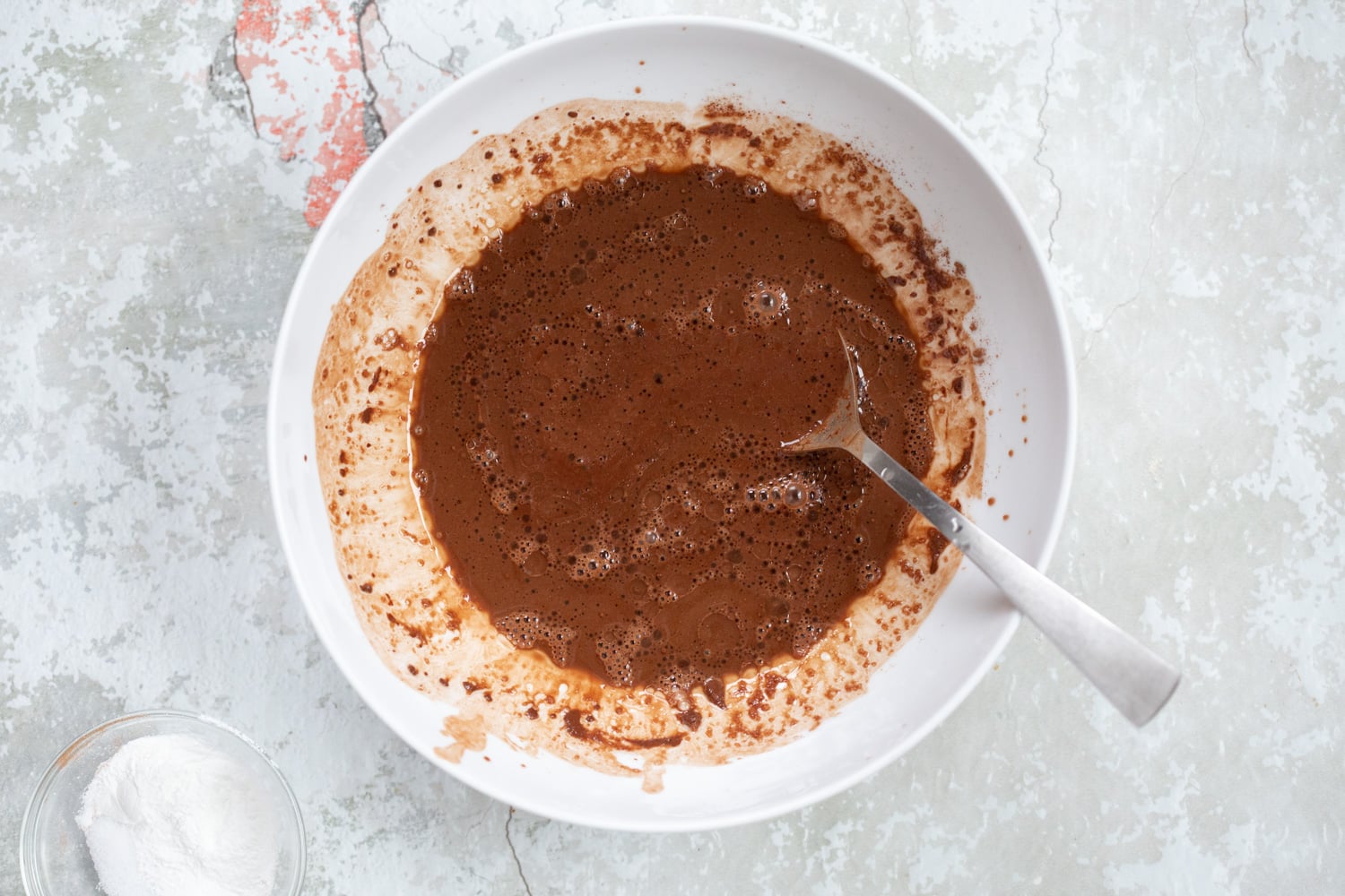 Vegan Chocolate Gingerbread Cake mixing process in white bowl
