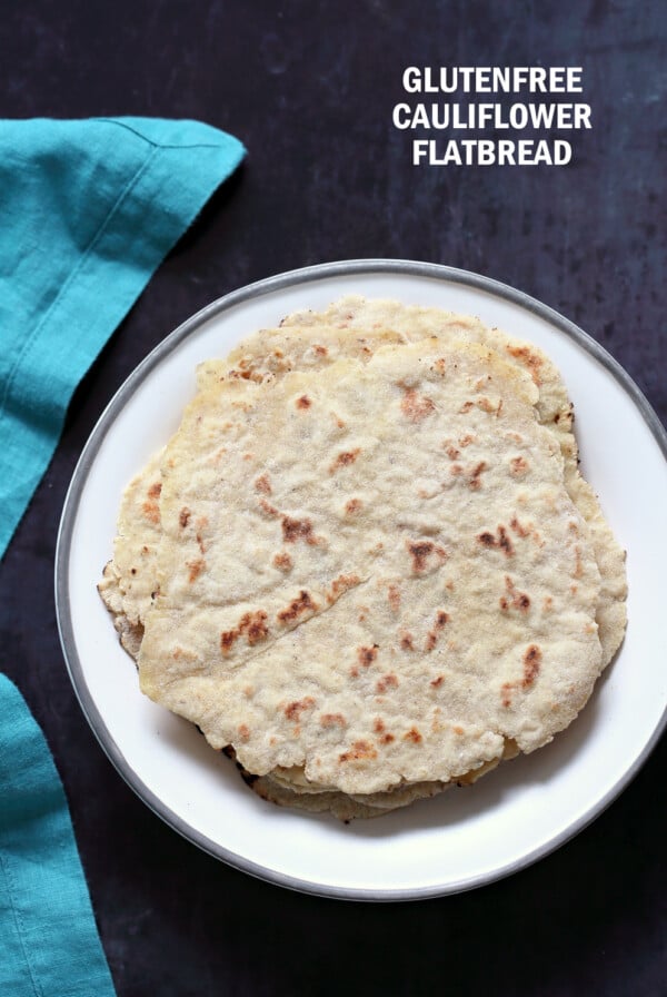 Gluten-free Cauliflower flatbread. This 7 Ingredient Gluten free flatbread is also grain-free, nut-free and soy-free. It is soft and great for tacos and wraps. Add herbs of choice. Vegan Yeastfree Recipe