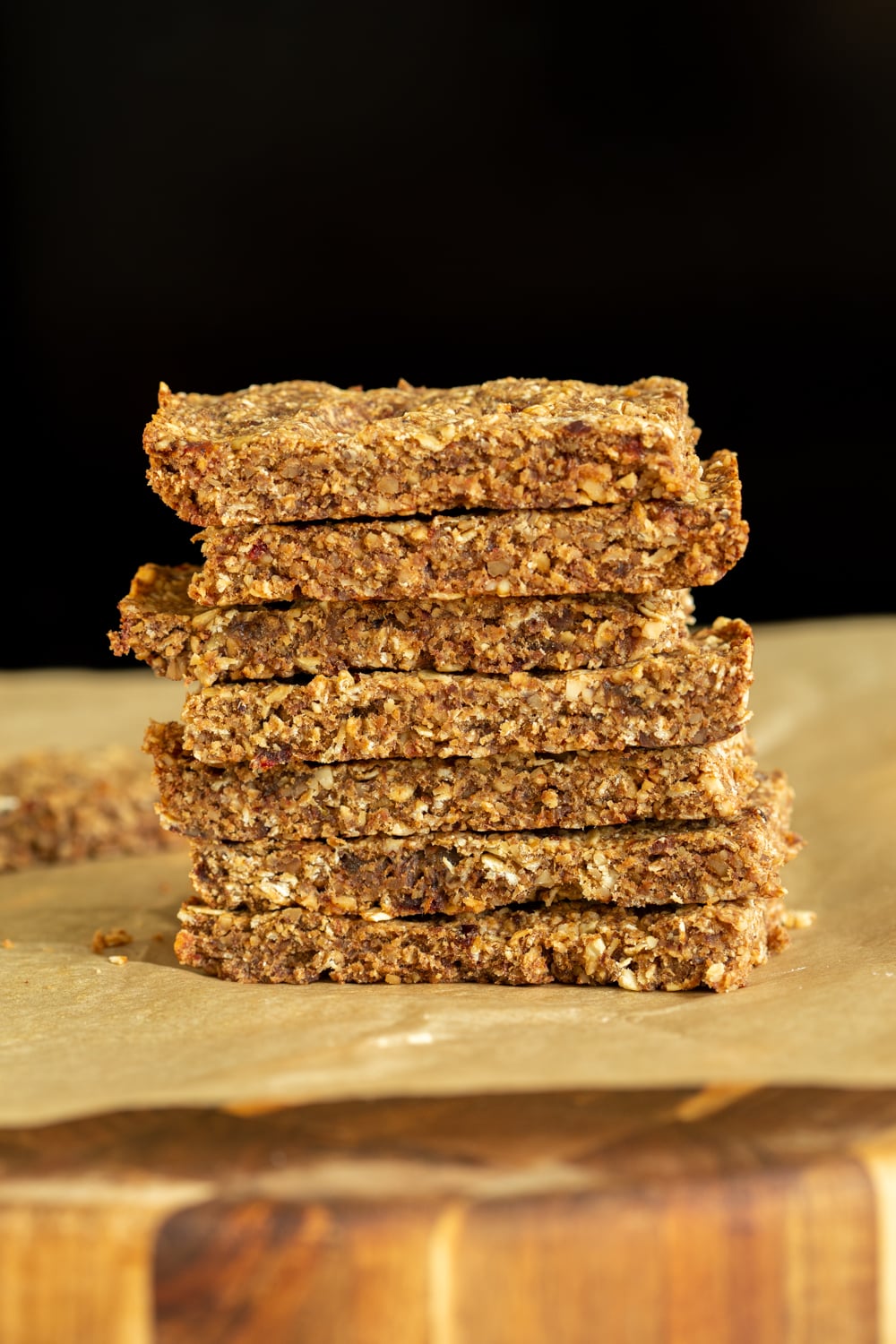 vegan granola bars side view of a stack of vegan caramelized banana granola bars