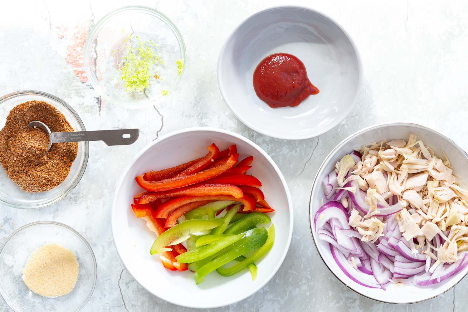 Ingredients for Chili lime roasted veggies and jackfruit in bowls