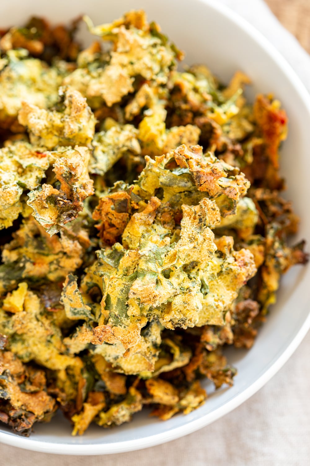 Kale Pakora in a white bowl 