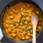 Tofu and Cauliflower in Kohlapuri Sauce in a Black skillet