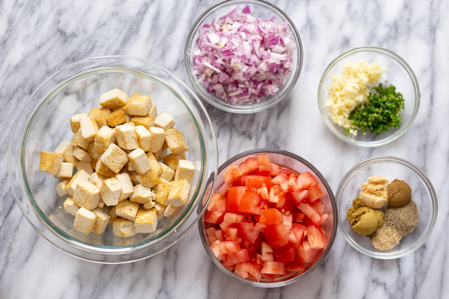 overhead shot of ingredients needed for making Tofu Dum Kali Mirch