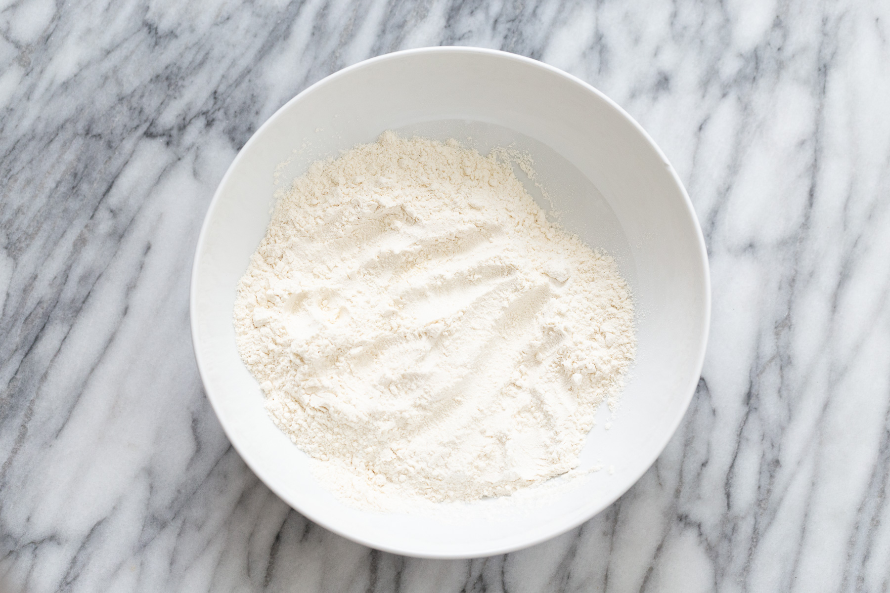 peanut butter and jelly cake dry cake mix in a white bowl