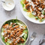 bbq roasted cauliflower salad bowl drizzled with Vegan Ranch Dressing