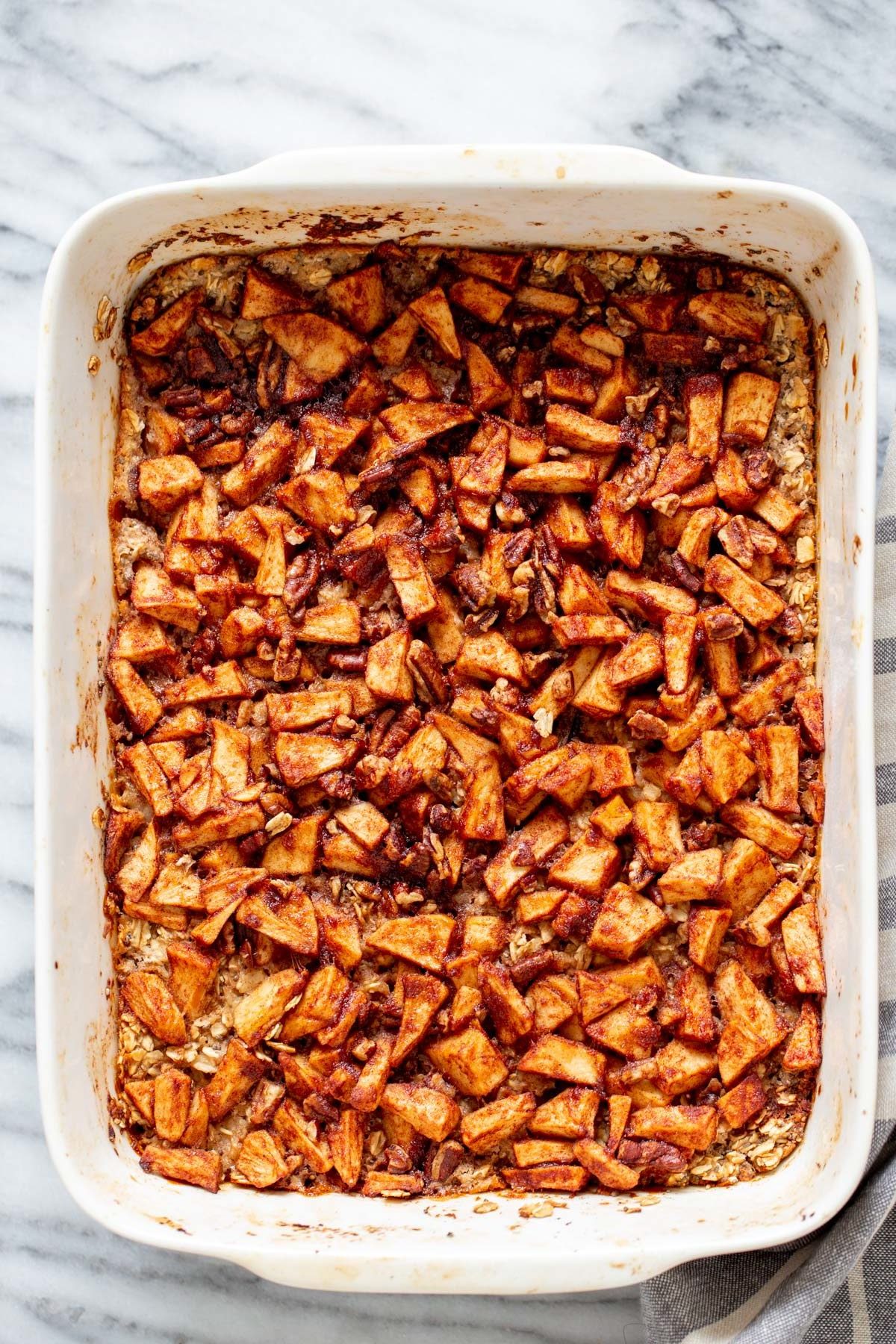 apple pie baked oatmeal overhead shot of a casserole dish with apple pie baked oatmeal