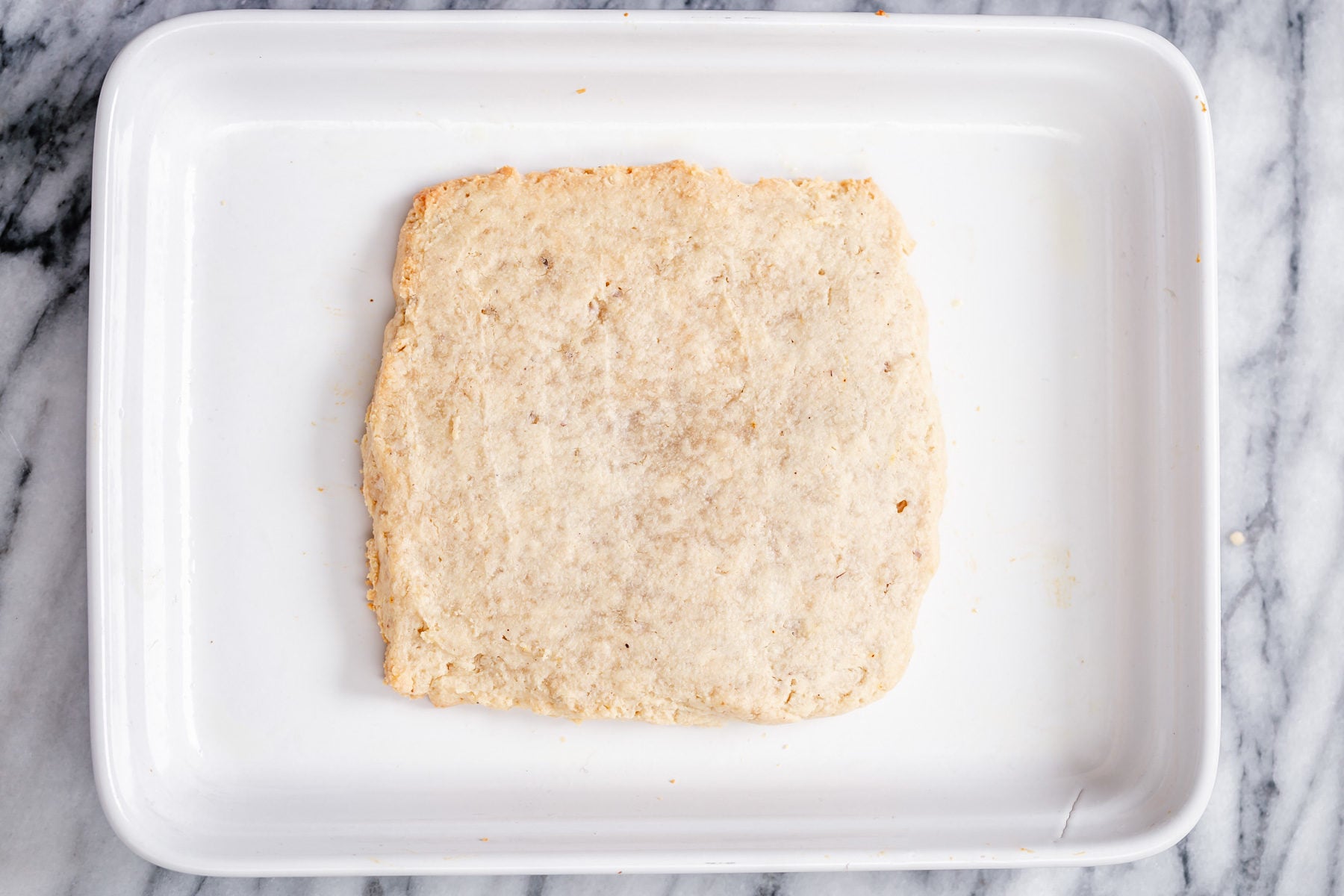 rasmalai cake baked vegan rasmalai cake in a square baking pan