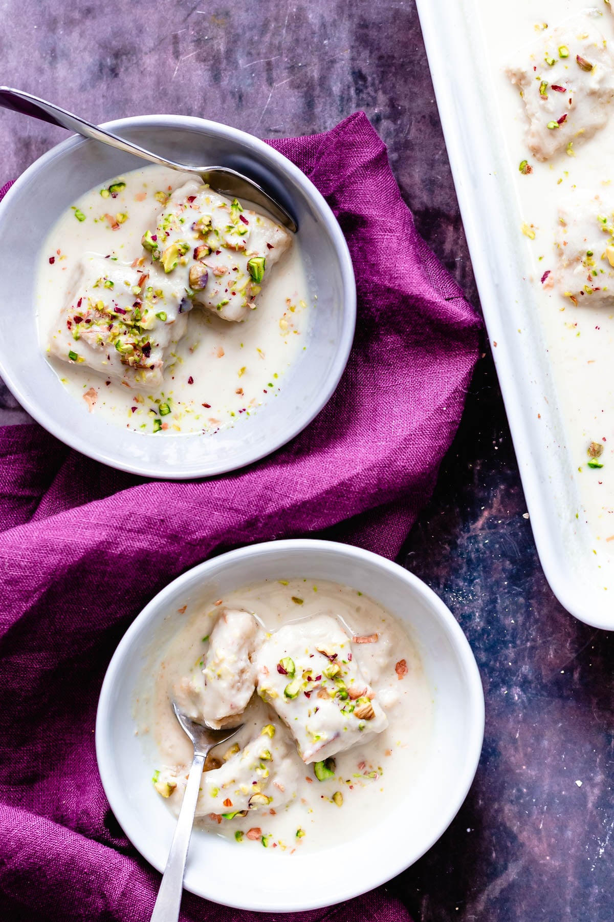 overhead shot of two servings of vegan rasmalai cake