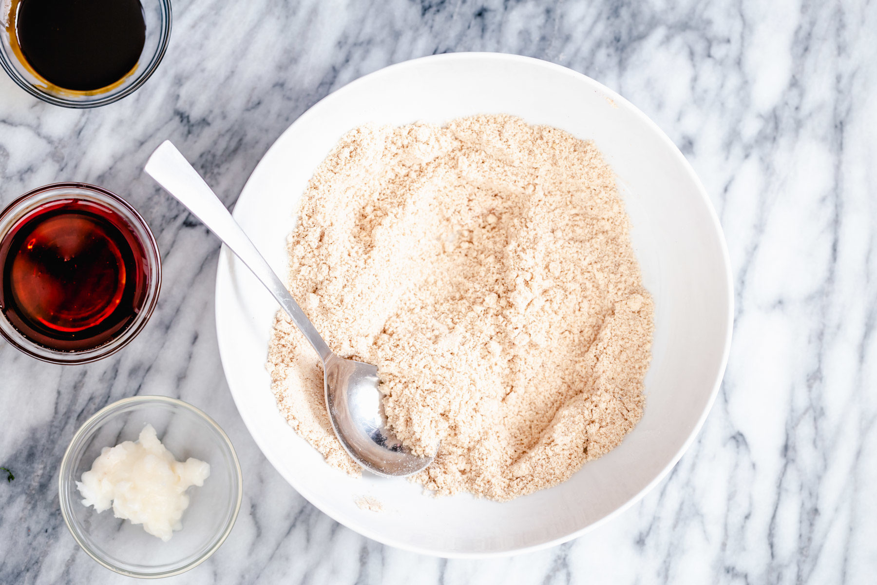 vegan gingerbread cookies vegan gingerbread cookie batter mix in a small white bowl