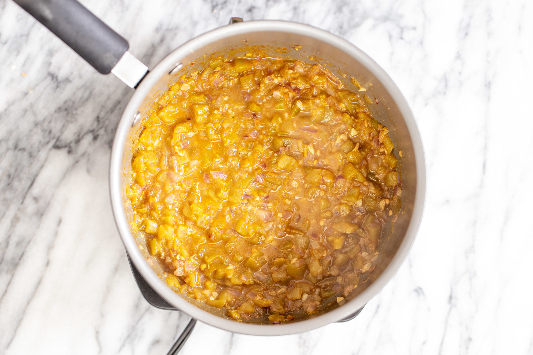 vegan enchilada soup vegan enchilada soup cooking in a sauce pan