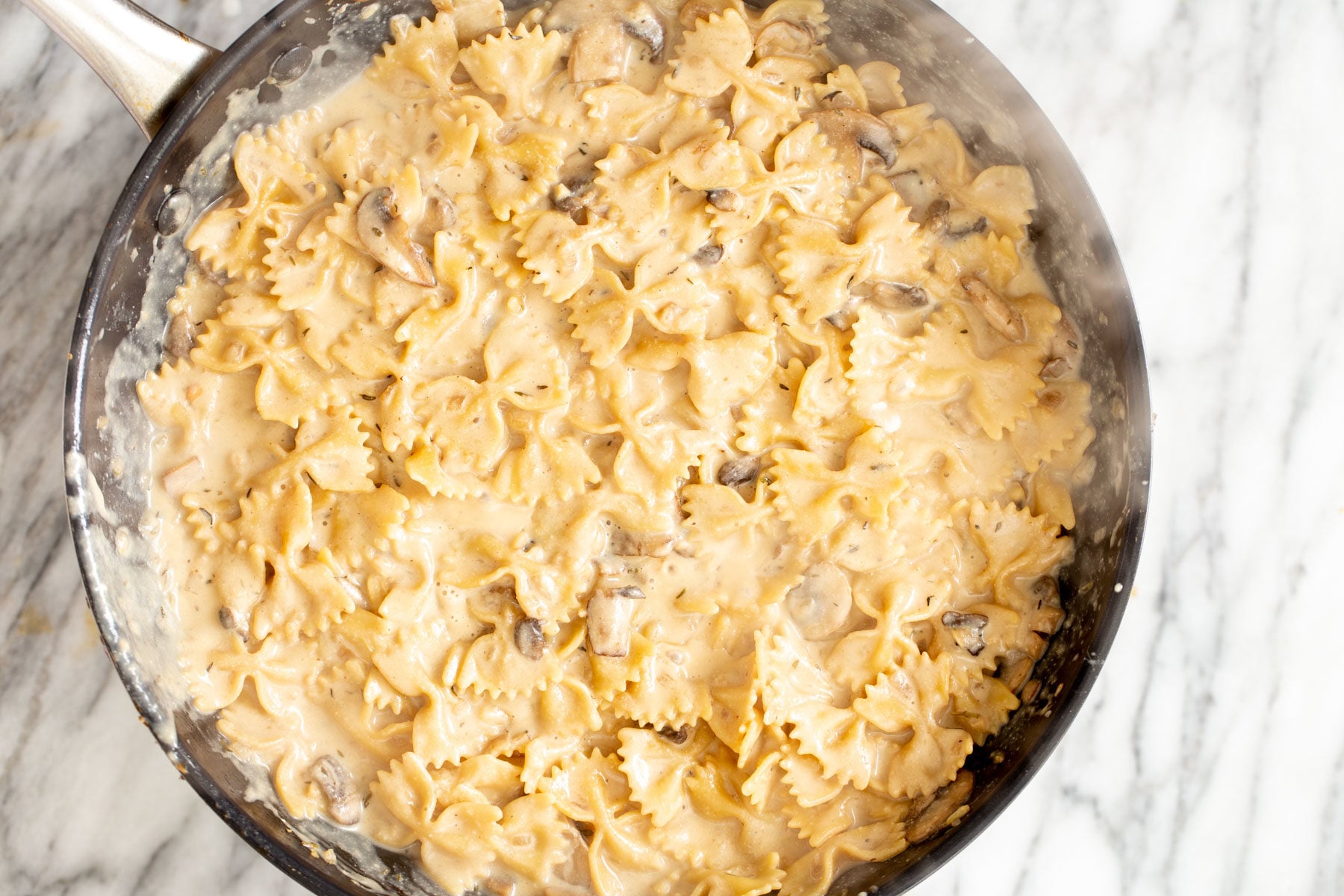 creamy vegan mushroom stroganoff in a saucepan 