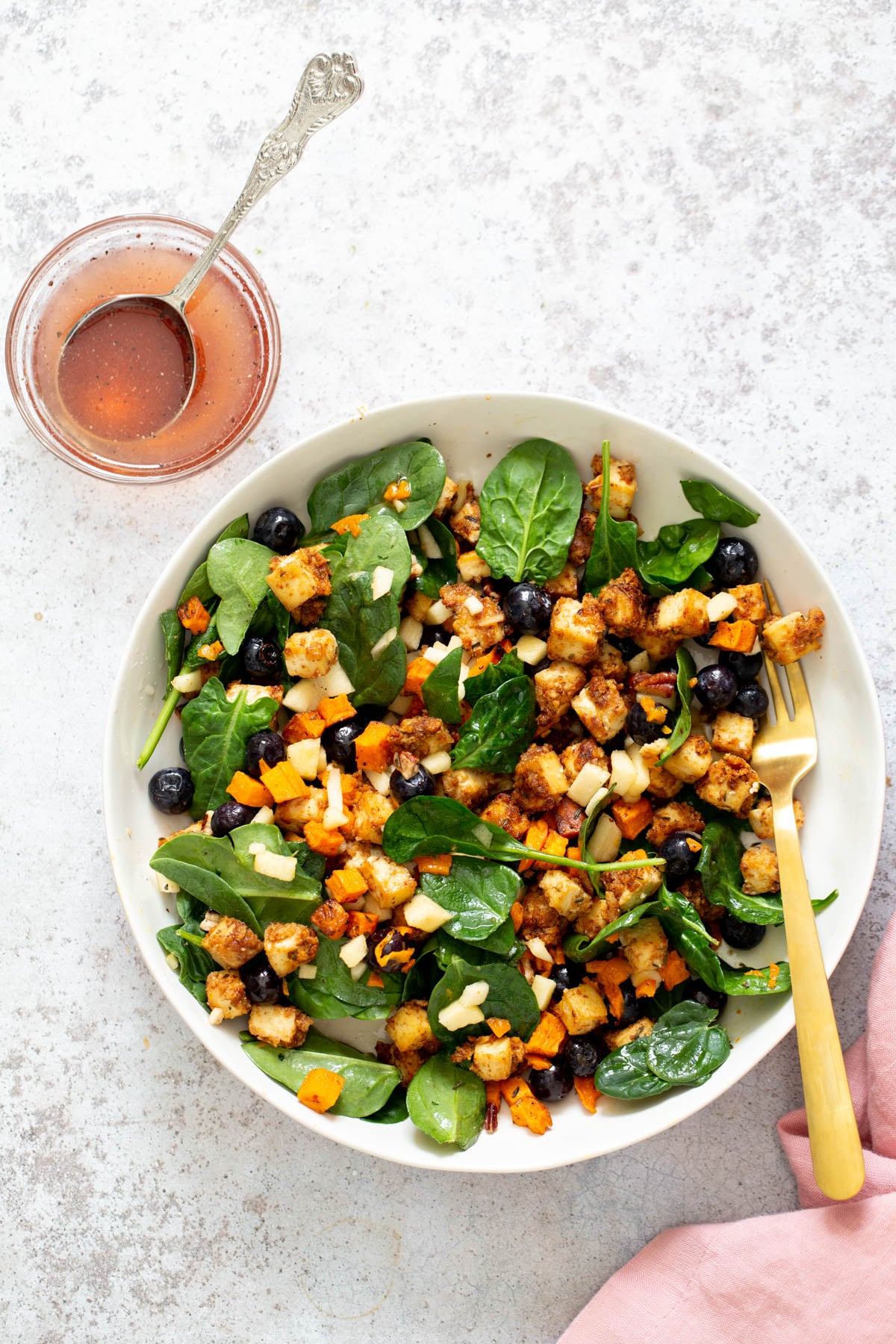 sweet potato tofu bowl sweet potato tofu bowls with blueberries and chunks of apple tossed in a shallow white bowl with maple mustard dressing