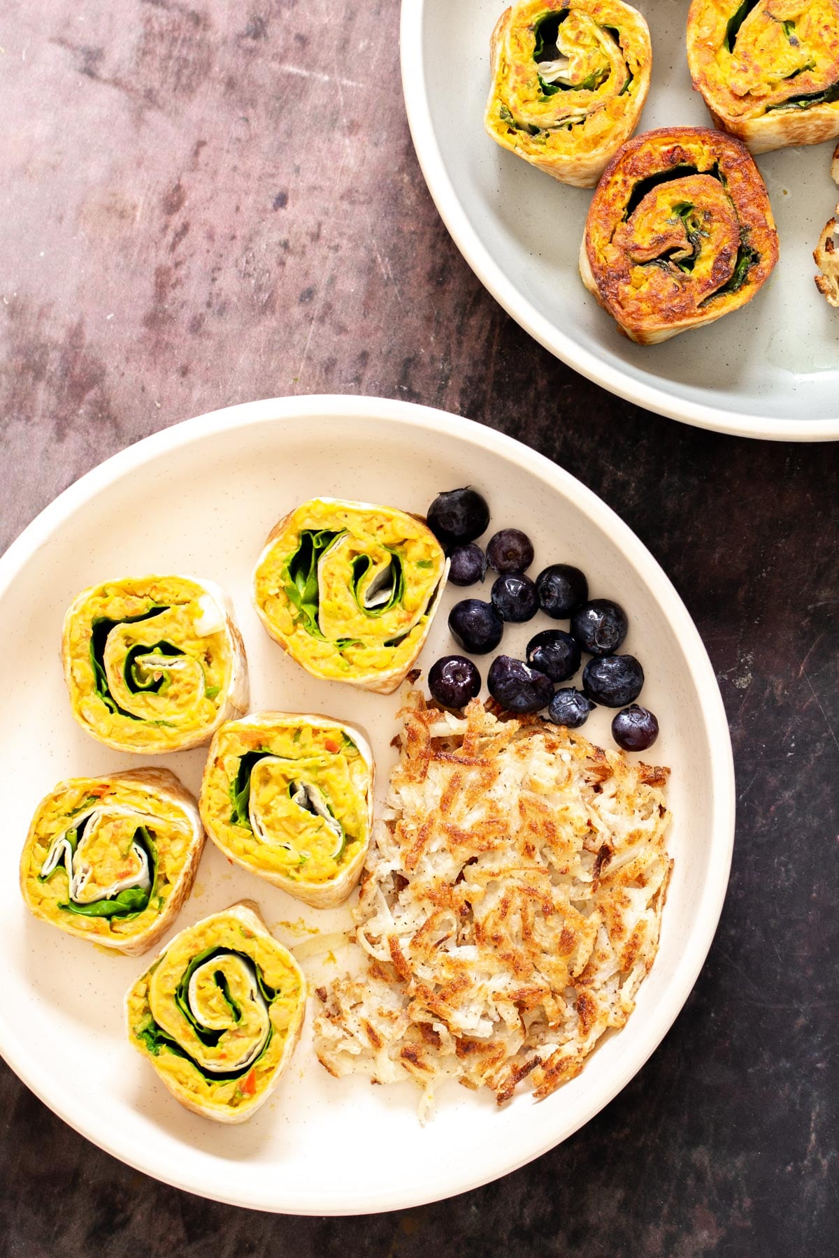 chickpea breakfast vegan chickpea breakfast platter with vegan chickpea scramble pinwheels, hash brown and berries