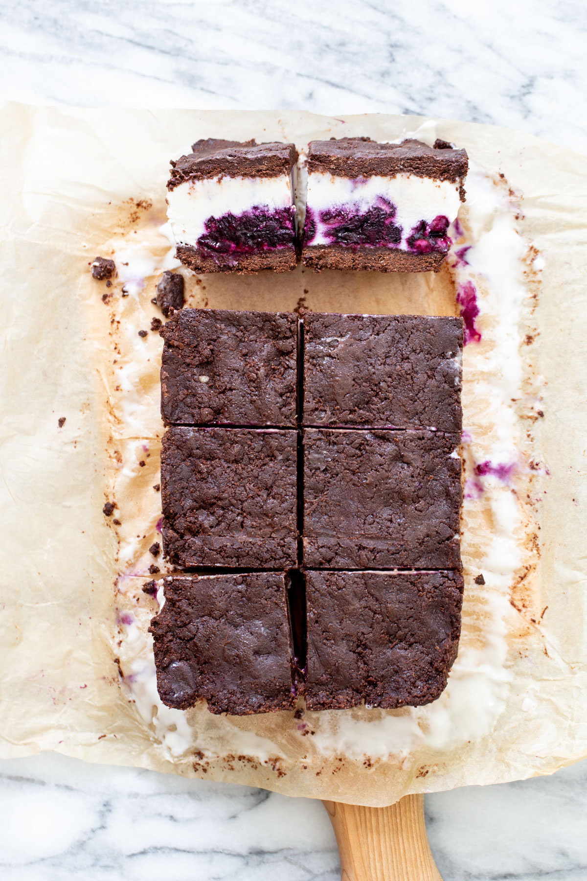 vegan vanilla ice cream sandwiches being cut into squares
