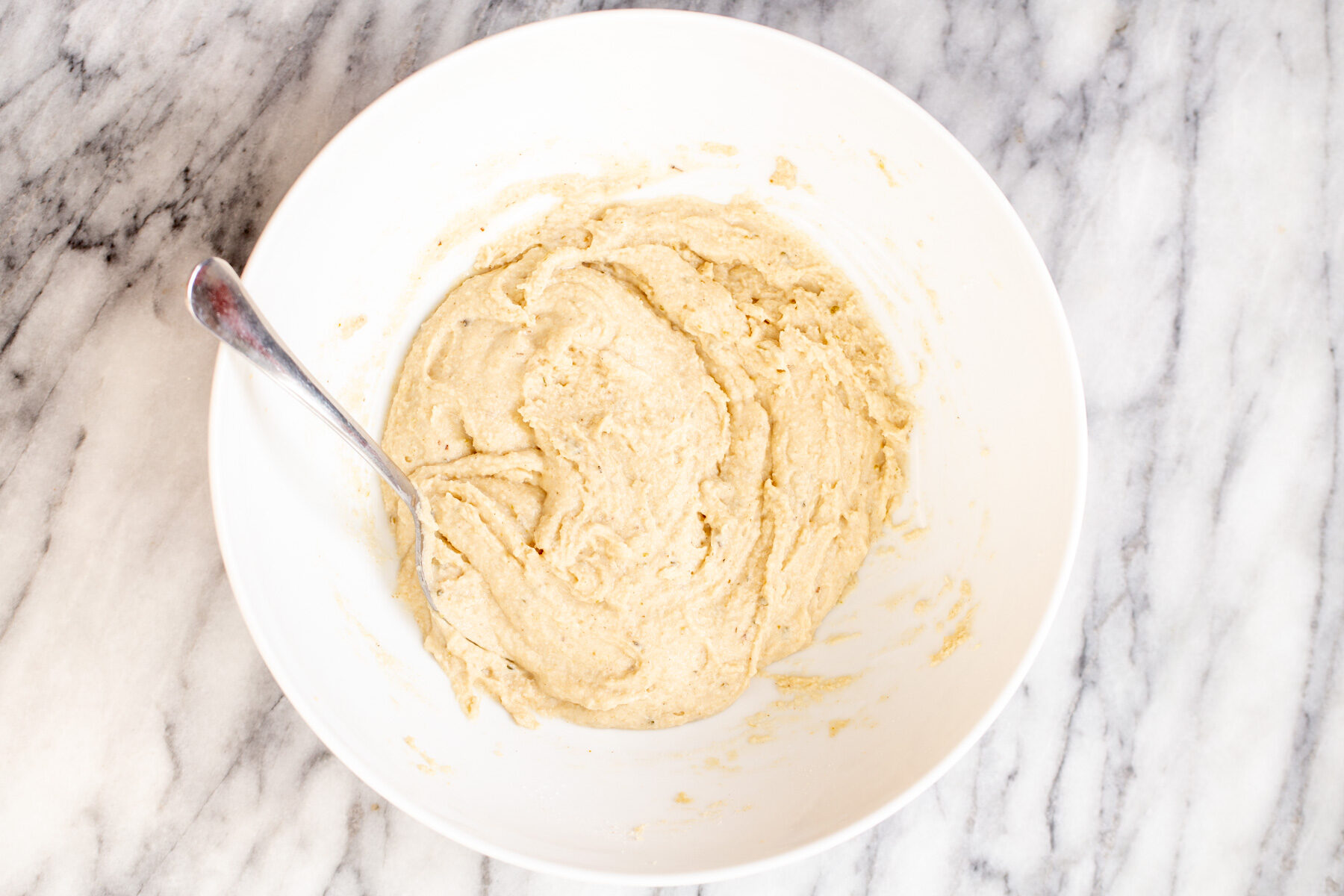 glutenfree focaccia bread dough in a white bowl
