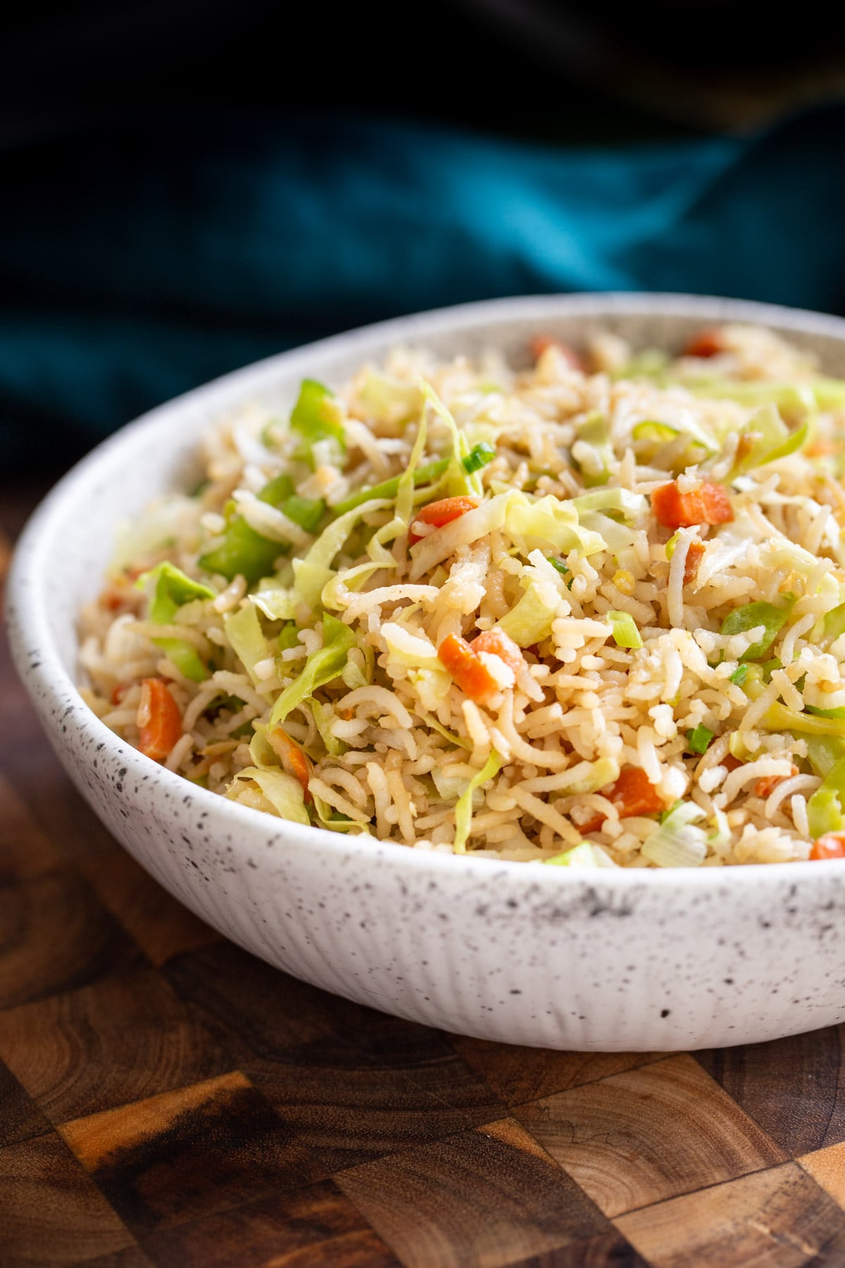 Indo Chinese fried rice side view of a bowl of Indo Chinese Fried rice
