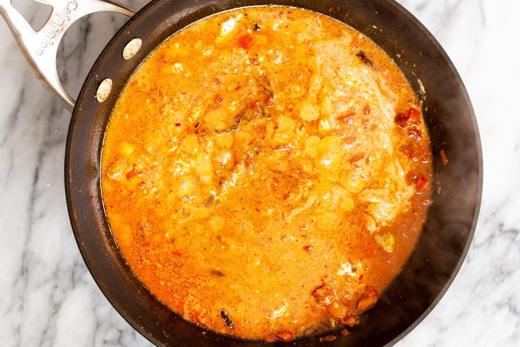 sauteeing pan with vegan tofu rogan josh