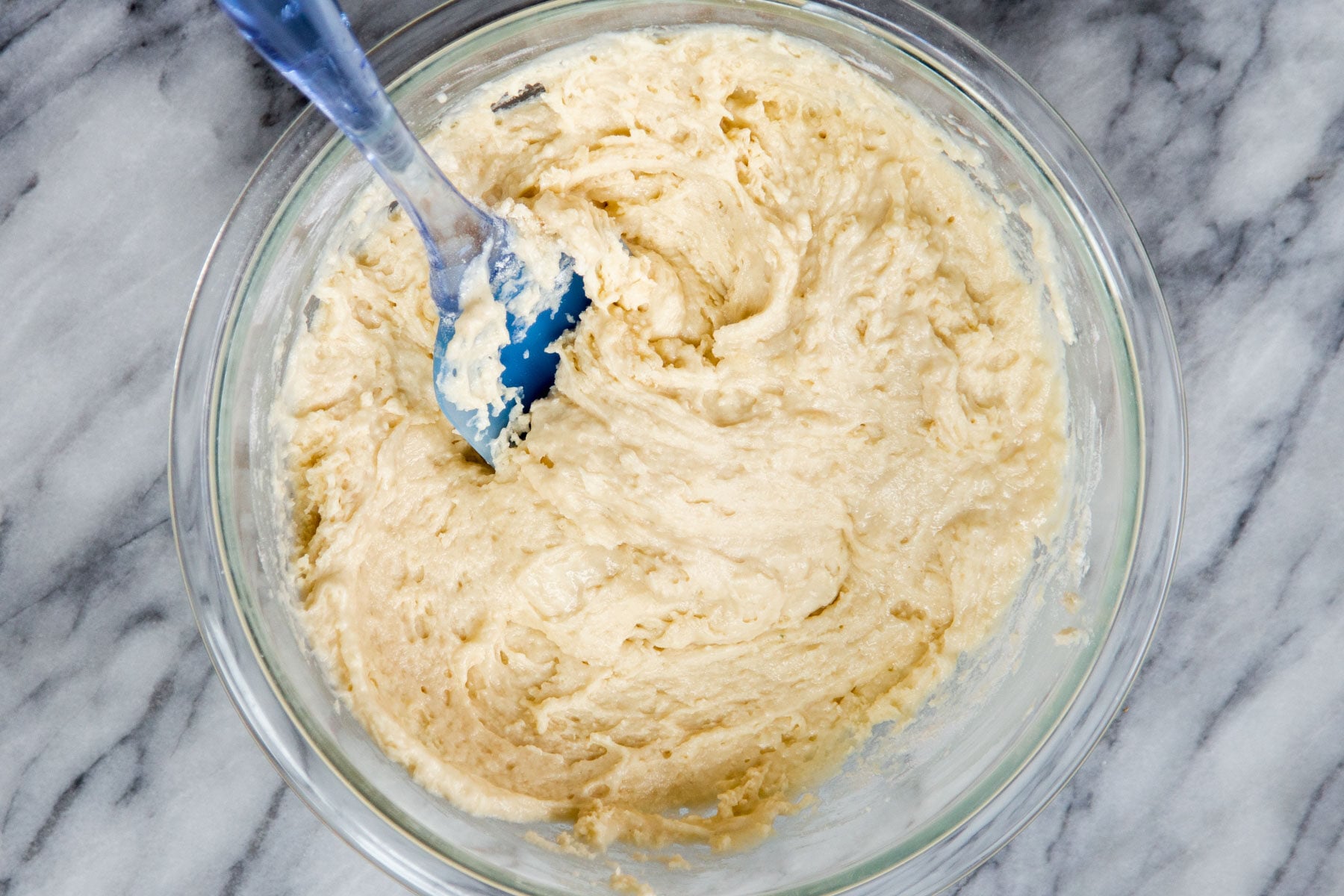 vegan marble cake batter in a glass bowl 