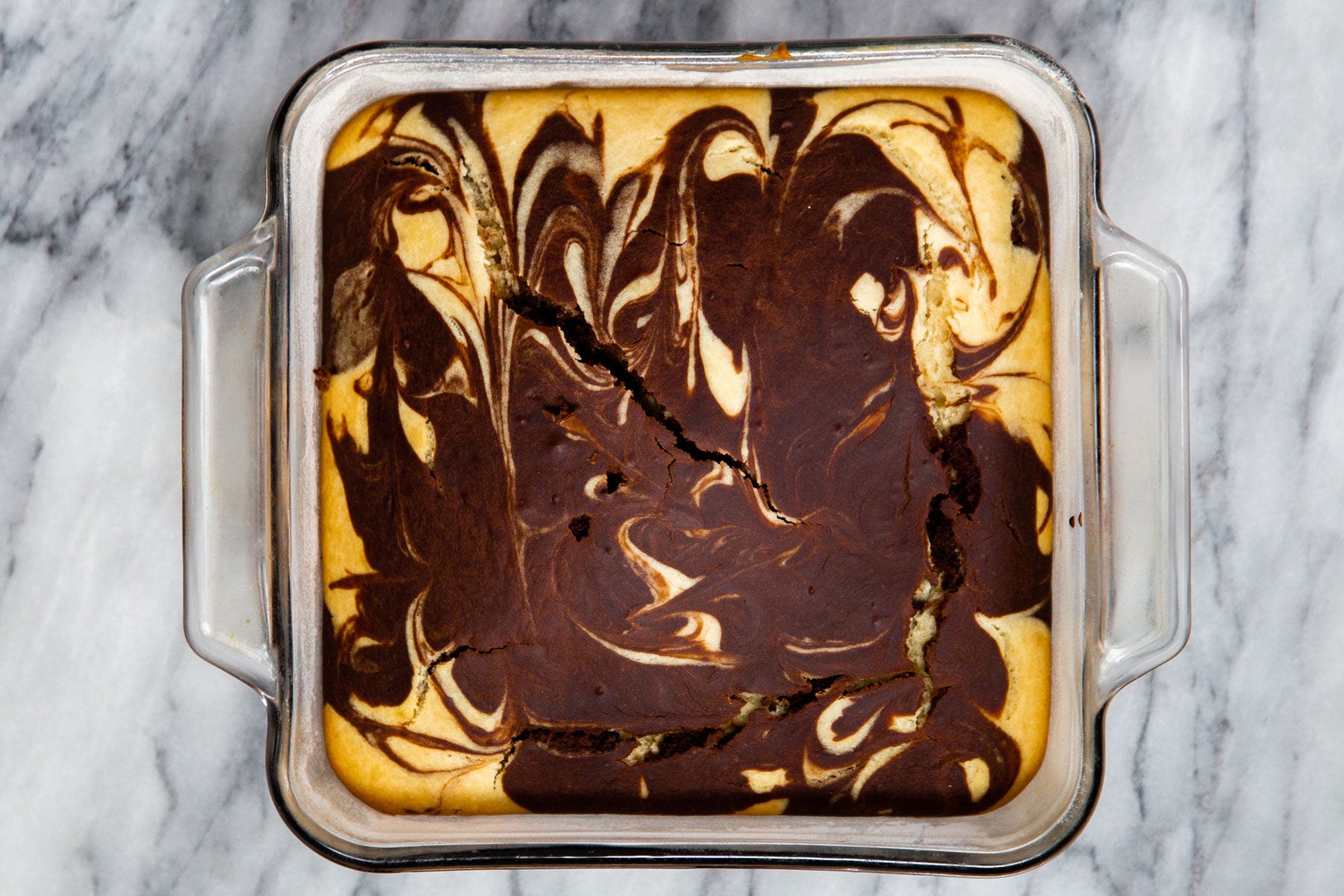 freshly baked vegan marble cake in a square cake pan 