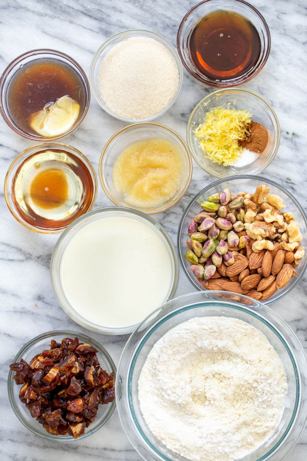 ingredients for making baklava cake on a marble counter 