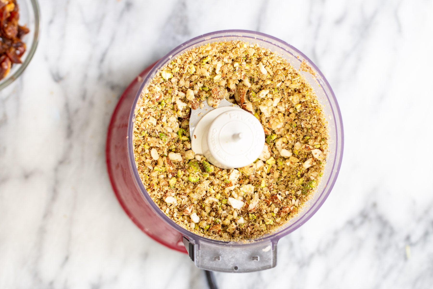 chopped nuts in a food processor 