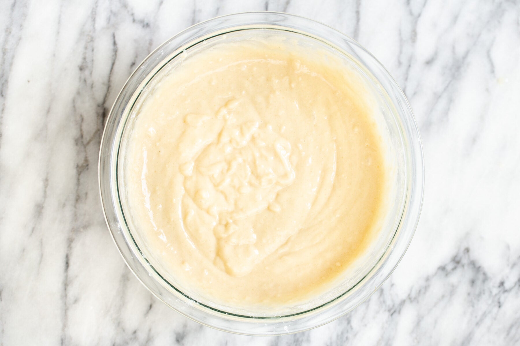 vegan cake batter in a glass bowl 