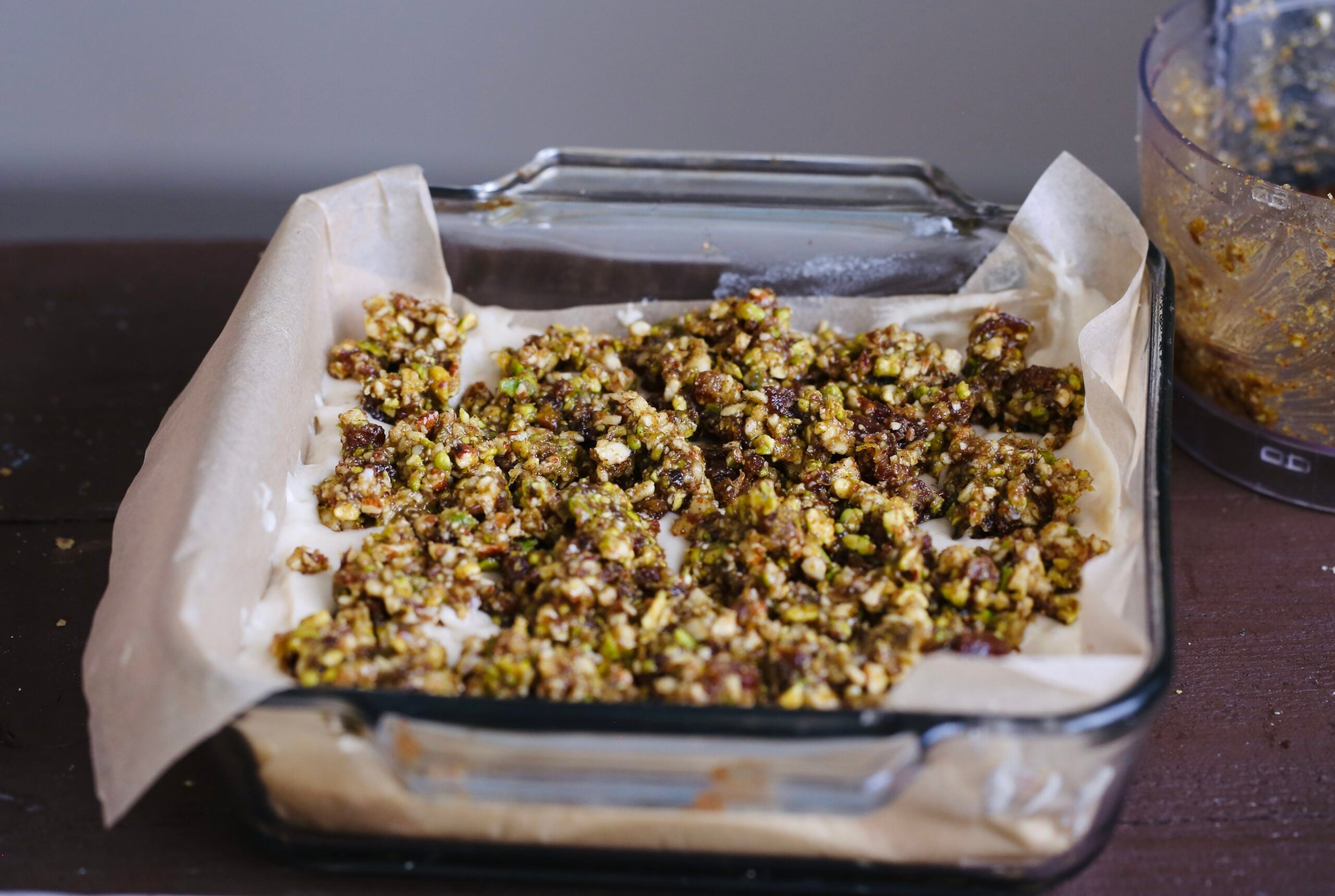  baklava cake batter in square baking dish  