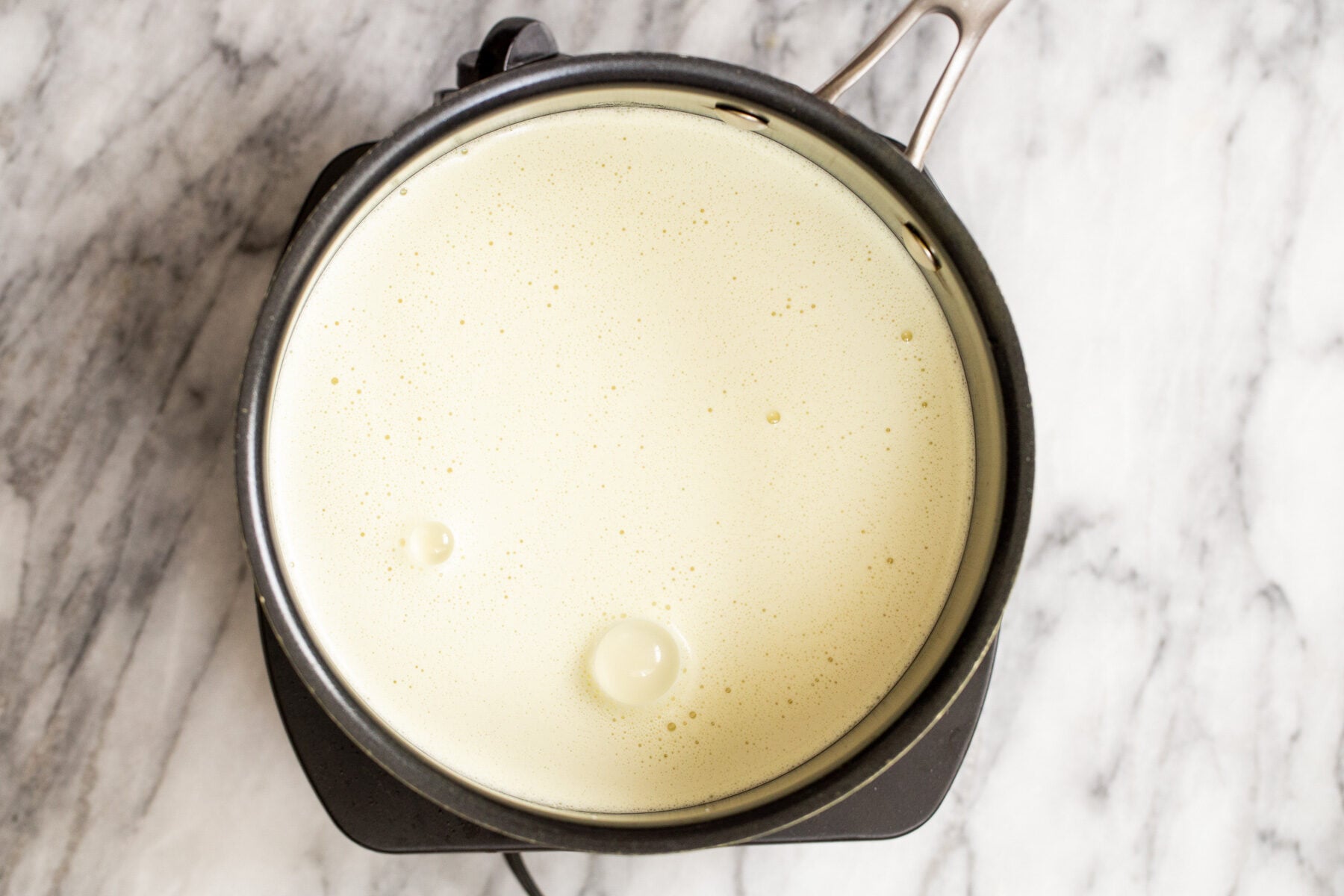 vegan custard ingredients in a saucepan