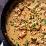 vegan kasuri malai murg in the pan, after cooking with fresh herbs sprinkled on top
